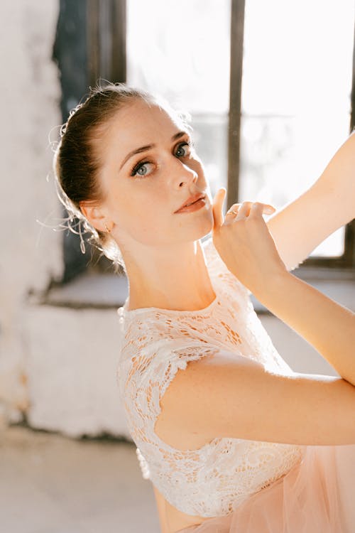 Woman in White Lace Top