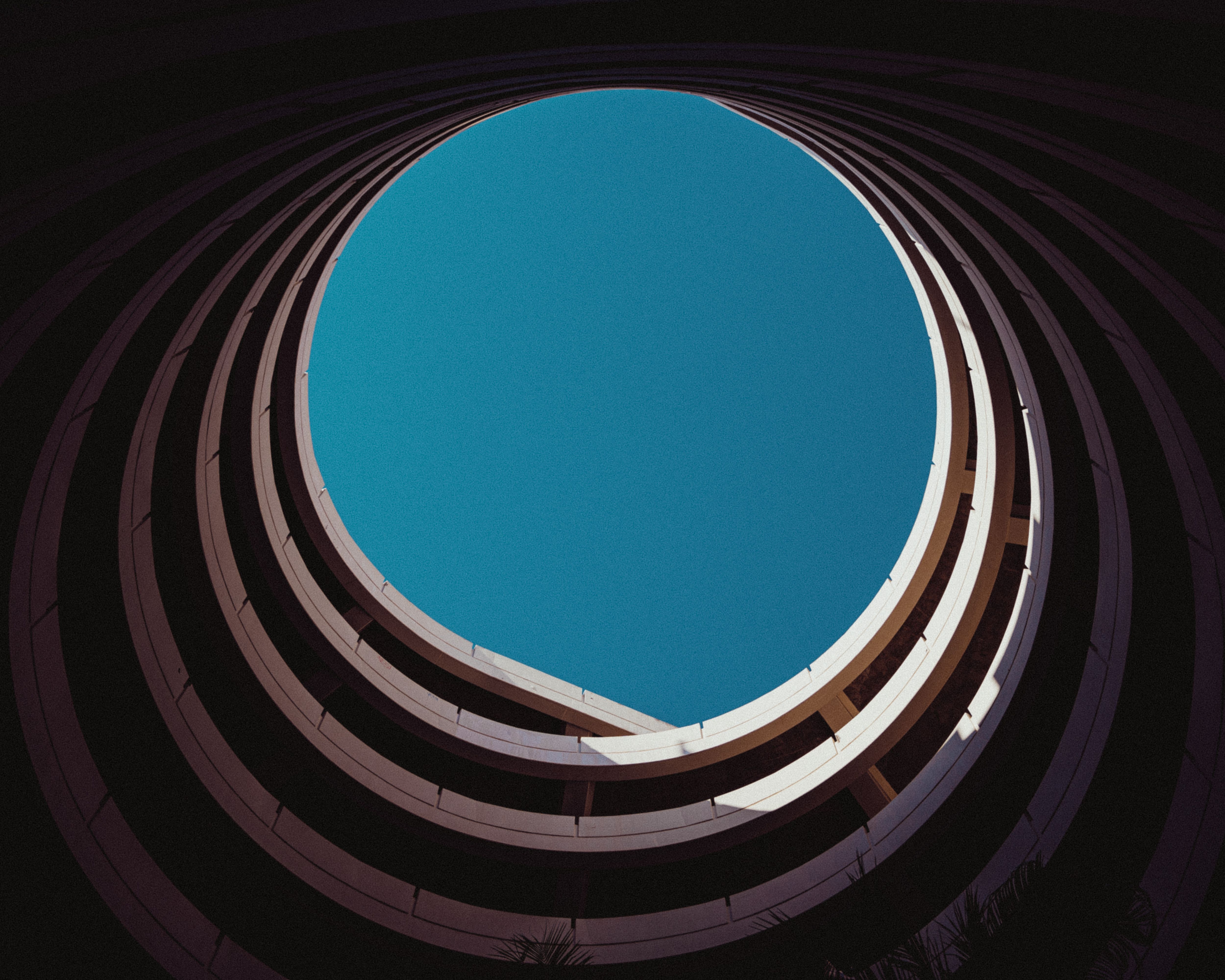 Low Angle Shot of Building under Clear Blue Sky · Free Stock Photo