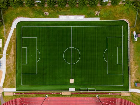 Drone shot of a soccer field with a track in Menomonie, WI from above.