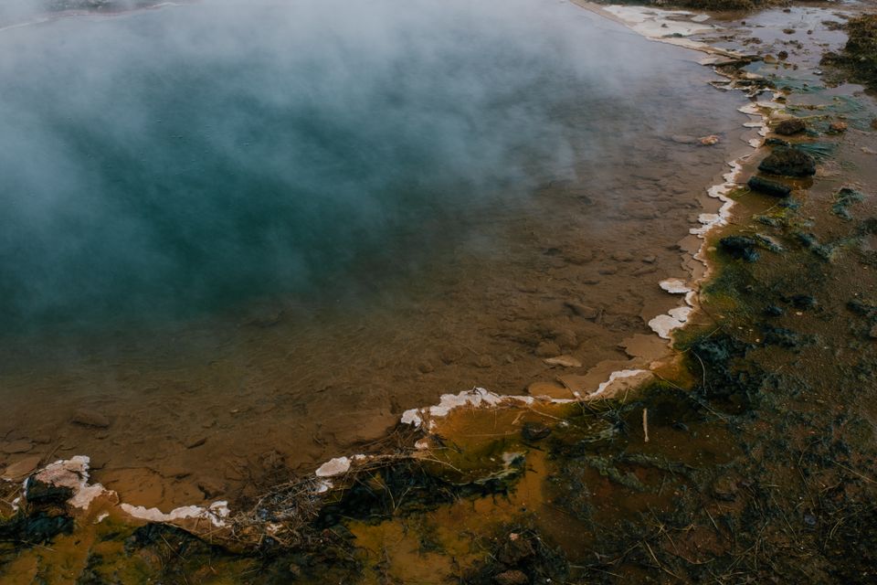 The Río Caldera runs cold and fast beside the pools — the hot-cold contrast is the best thing about the site