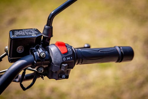 Close-Up Shot of a Motorcycle Handle Grip