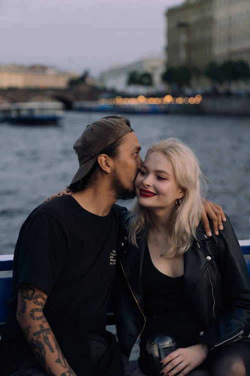 Free Man kissing his Partner Stock Photo