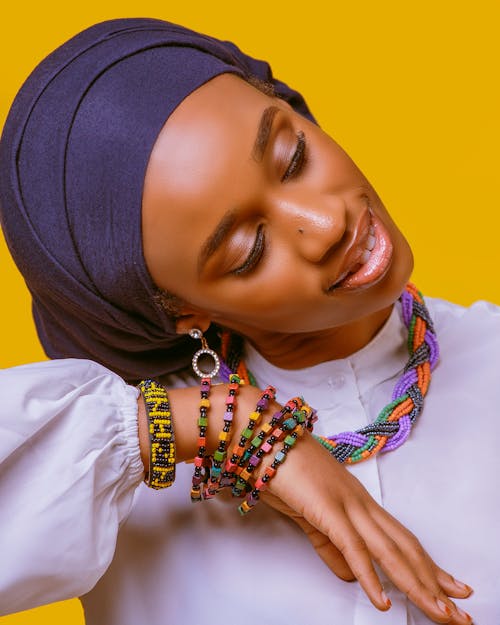 Smiling African model in dark blue turban