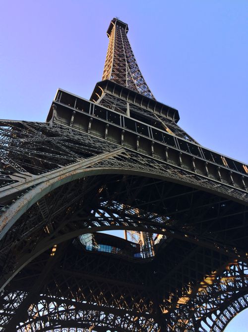 Free A low-angle shot capturing the intricate design of the Eiffel Tower in Paris, France. Stock Photo