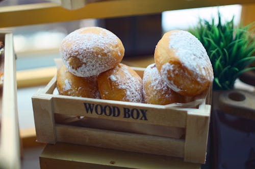 Doughnuts in Brown Wooden Crate