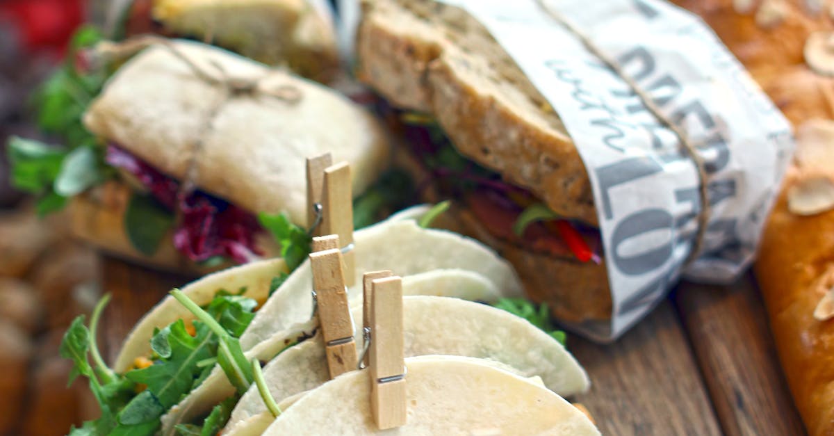 A variety of fresh seafood and vegetables displayed on a wooden table.