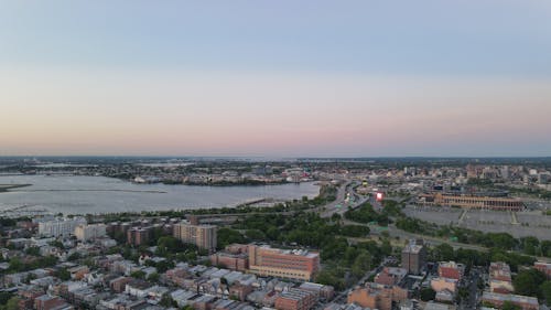 Aerial View of a City at Sunset 