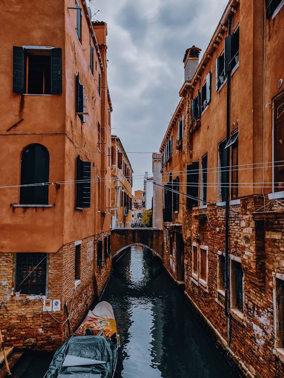 Old city district with river channel · Free Stock Photo