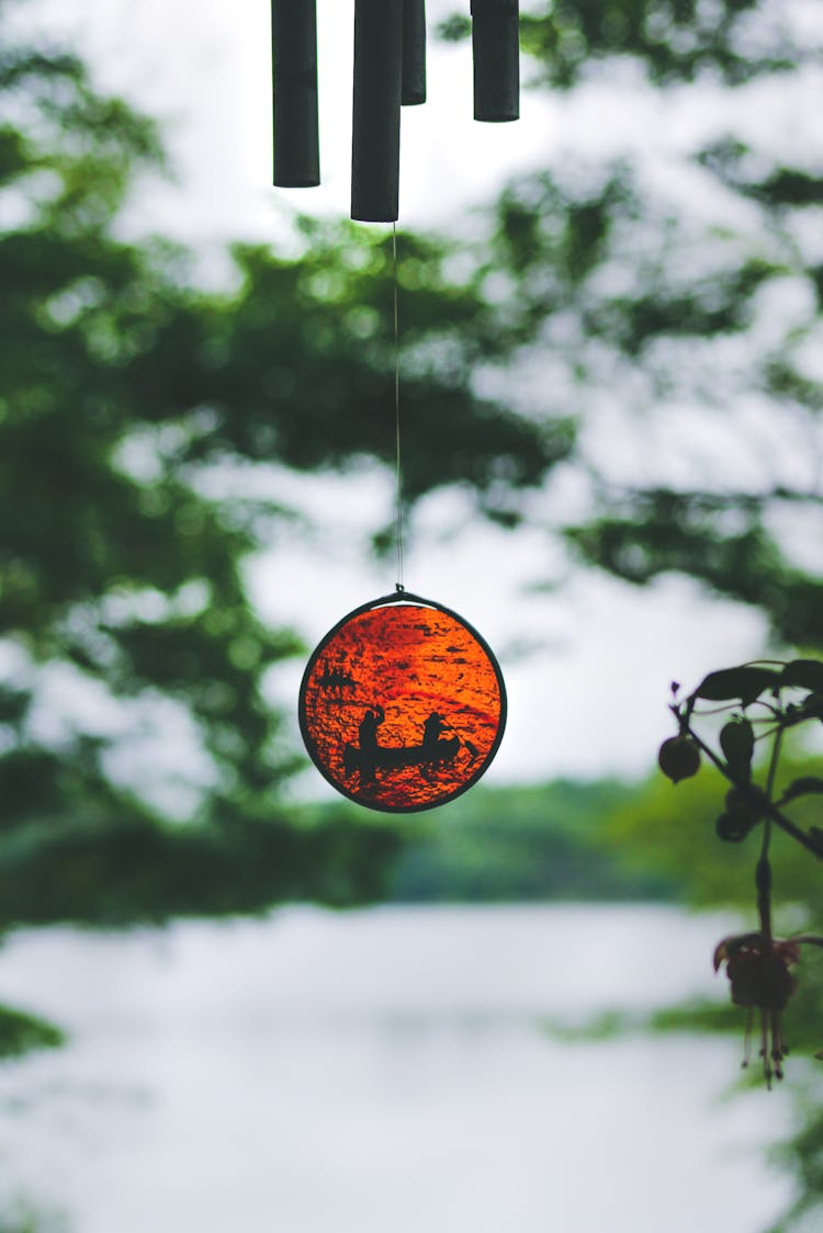 A Hanging Wind Chime In Close-up Photography