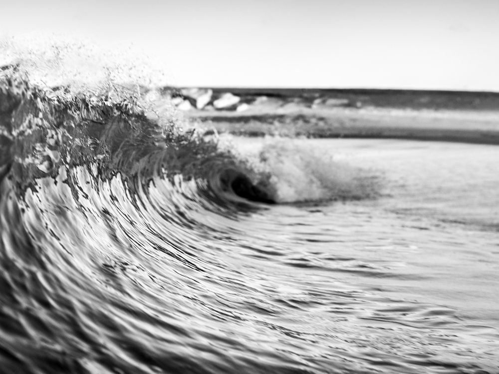 Grayscale Photo of Splash of Water on the Sea · Free Stock Photo