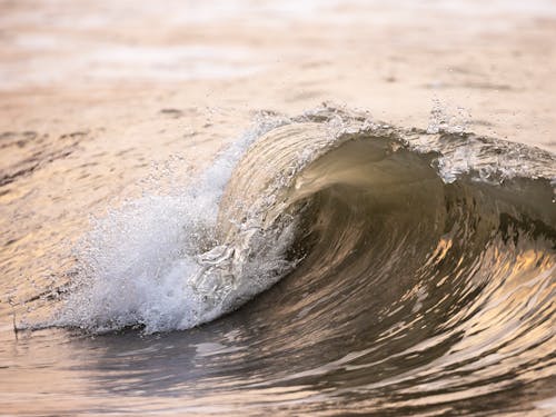 A Close-Up Shot of a Wave Crashing