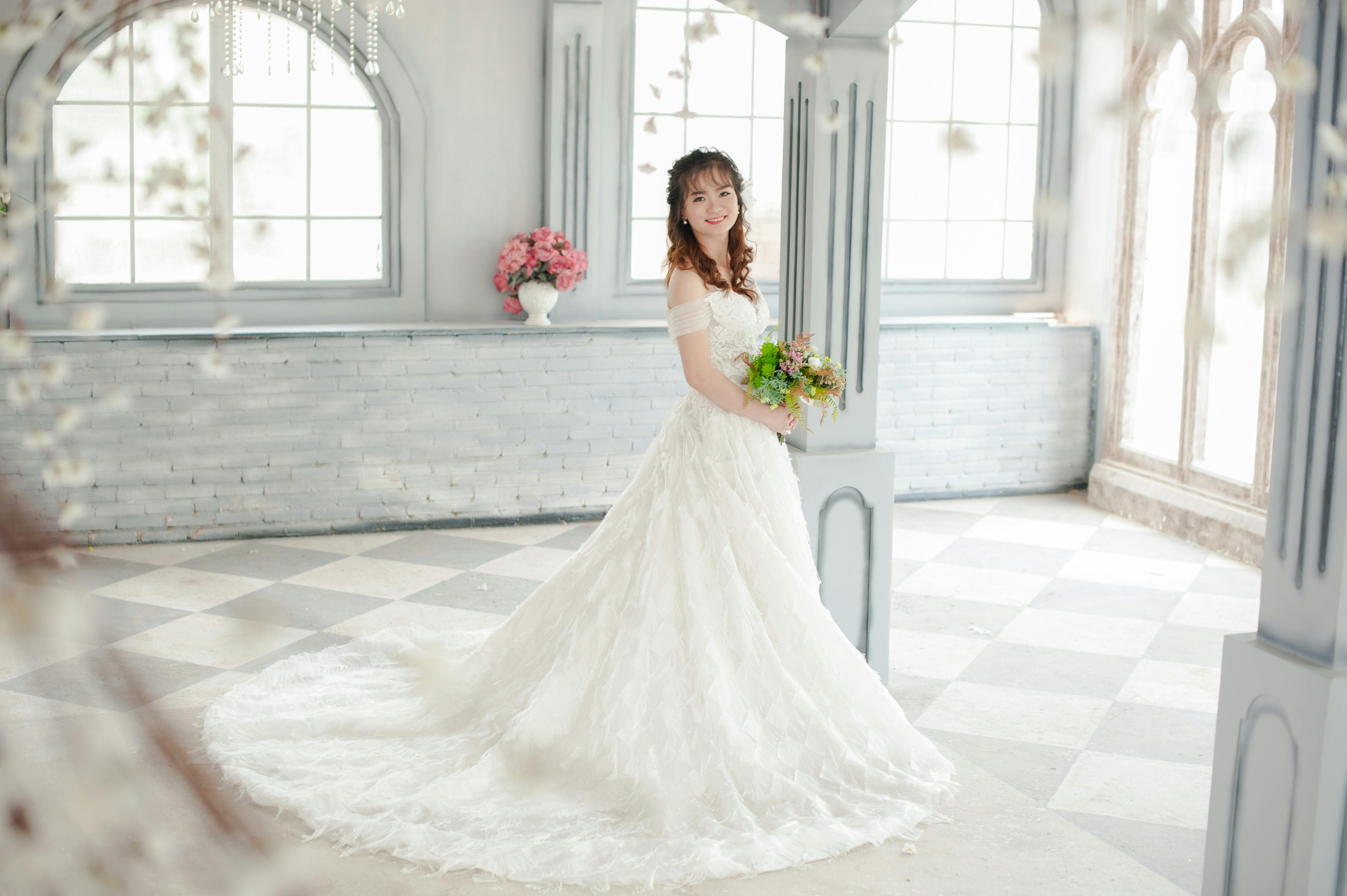 Premium Photo | Romantic bride with makeup and bridal hair wearing wedding  dress