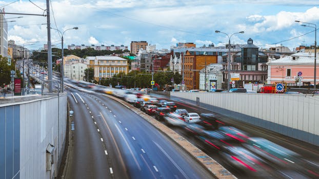 Dynamic cityscape of Moscow showcasing a busy road with vibrant motion blur capturing urban life.