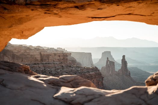 Breathtaking view of Canyonlands National Park in Utah showcasing rock formations at sunrise.