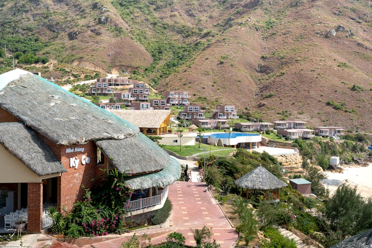 Small Settlement On Hilly Sunny Terrain