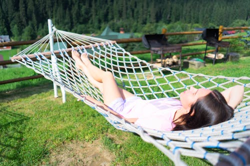 Woman Lying on Hammock