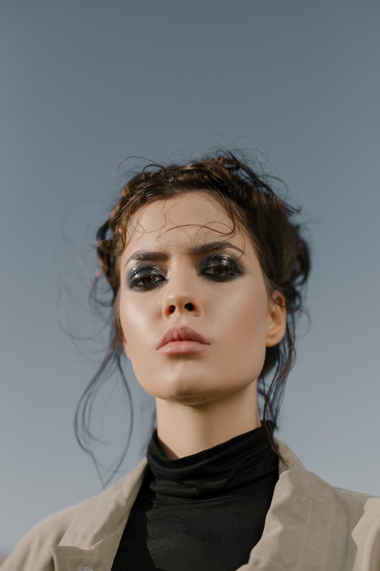 Low Angle Photo Of Woman With Dark Eyeshadow