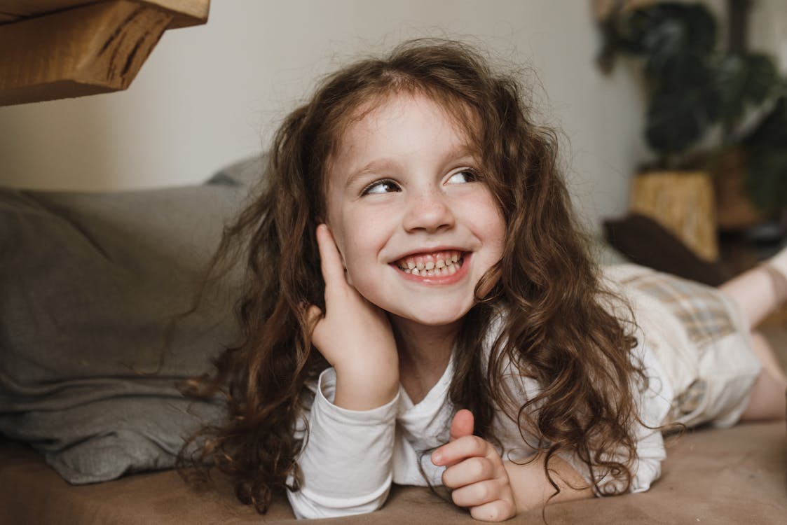 Free Close-up Photo of Happy Cute Girl Stock Photo