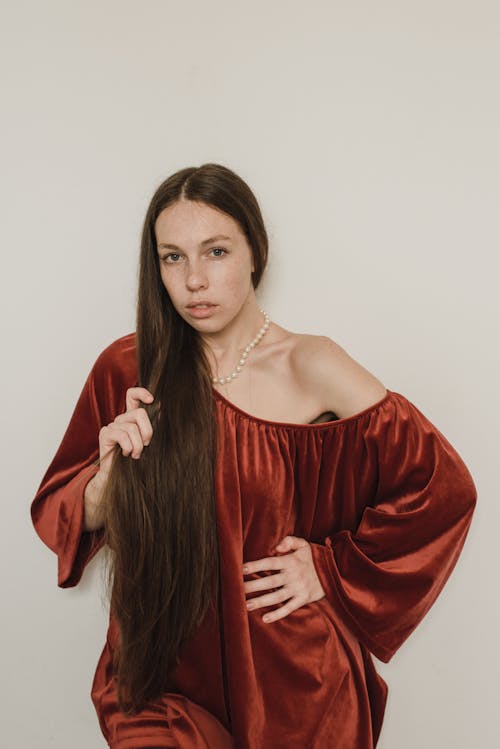 Woman in Red Off Shoulder Dress