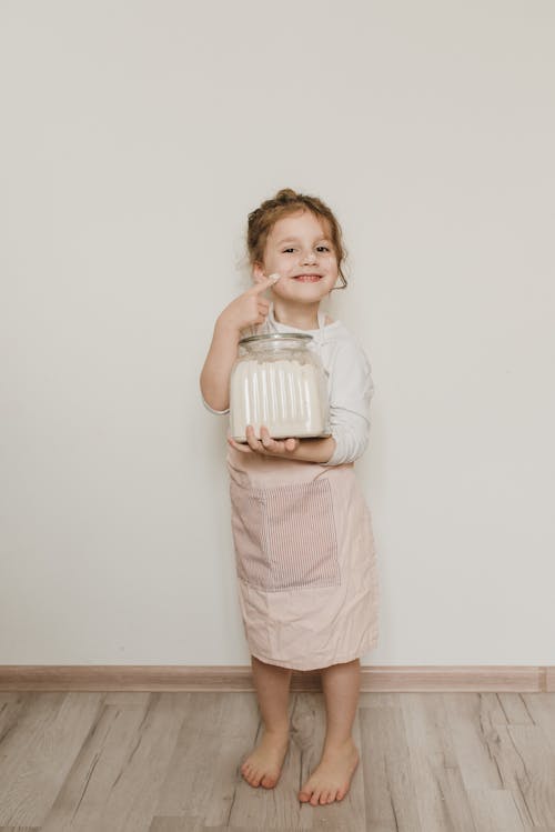 Free Girl Holding a Jar Stock Photo