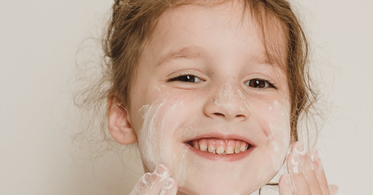 Girl Putting Powder on Her Face · Free Stock Photo