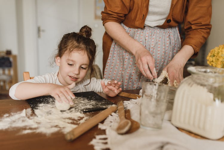 Girl Kneading Dough