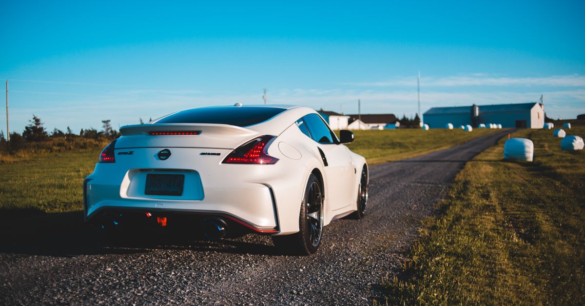Car For Rough Road Riding Contemporary sports car on rough roadway in countryside · Free Stock Photo