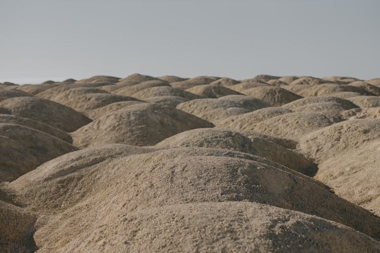 Sand Dunes Under A Gloomy Sky