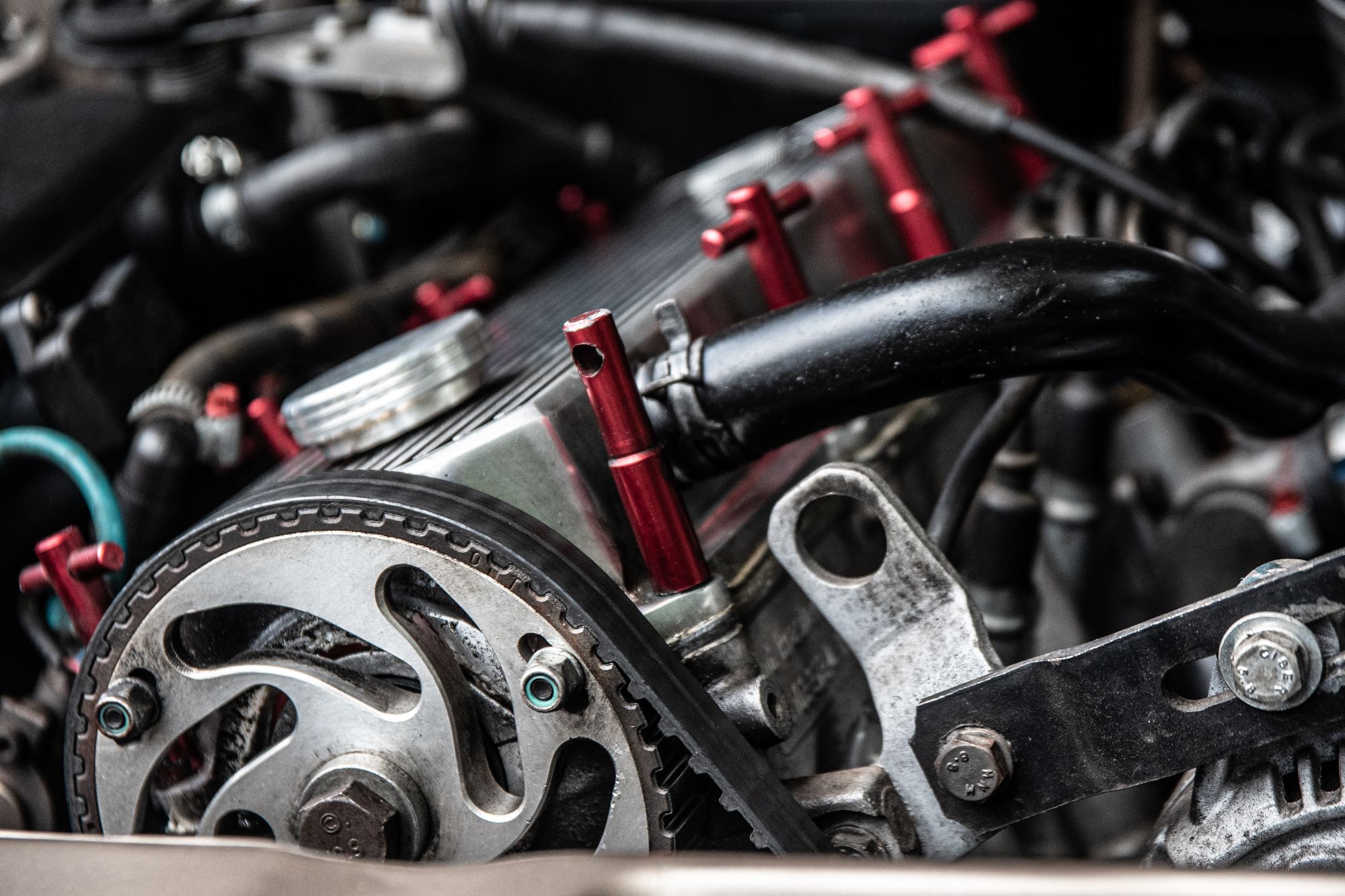 Clear close-up of a timing belt and engine components, directly relevant to the timing belt maintenance discussion in this&hellip;