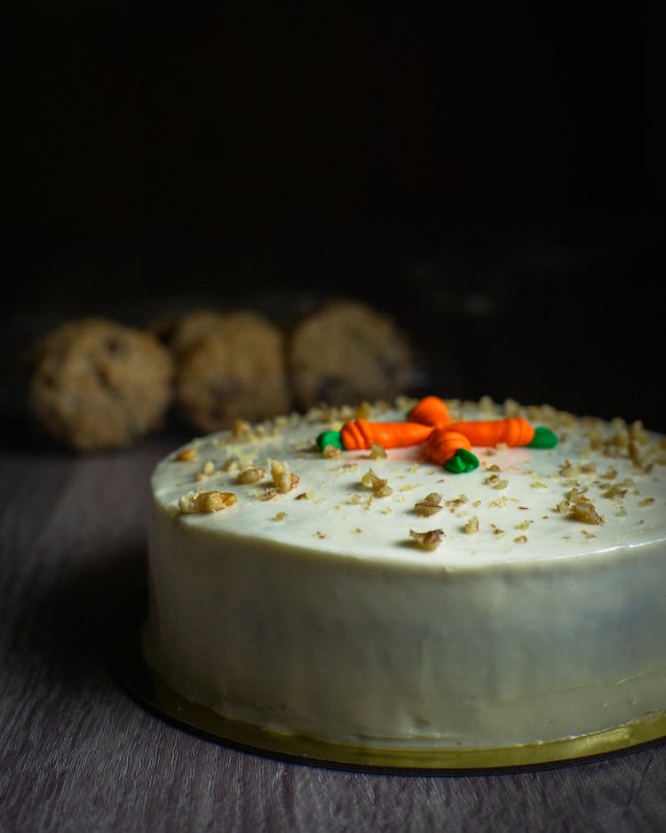 A Carrot Cake With White Frosting