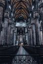 Perspective view of stylish interior of Milan Cathedral with high ceiling and ornamental columns located in Italy