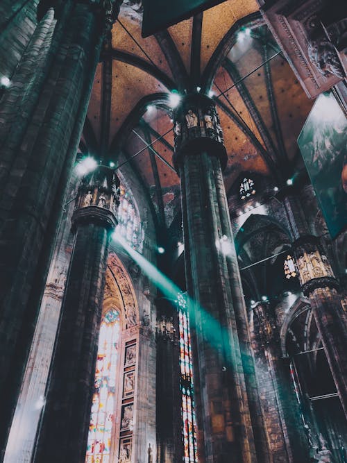 Free Classic cathedral with sunlight through stained glass Stock Photo