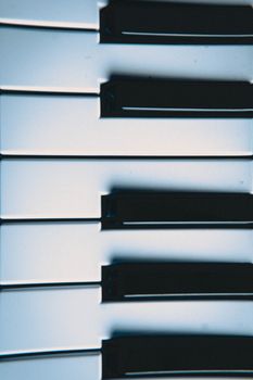 Detailed close-up of piano keys with a vertical orientation, perfect for music-themed designs.