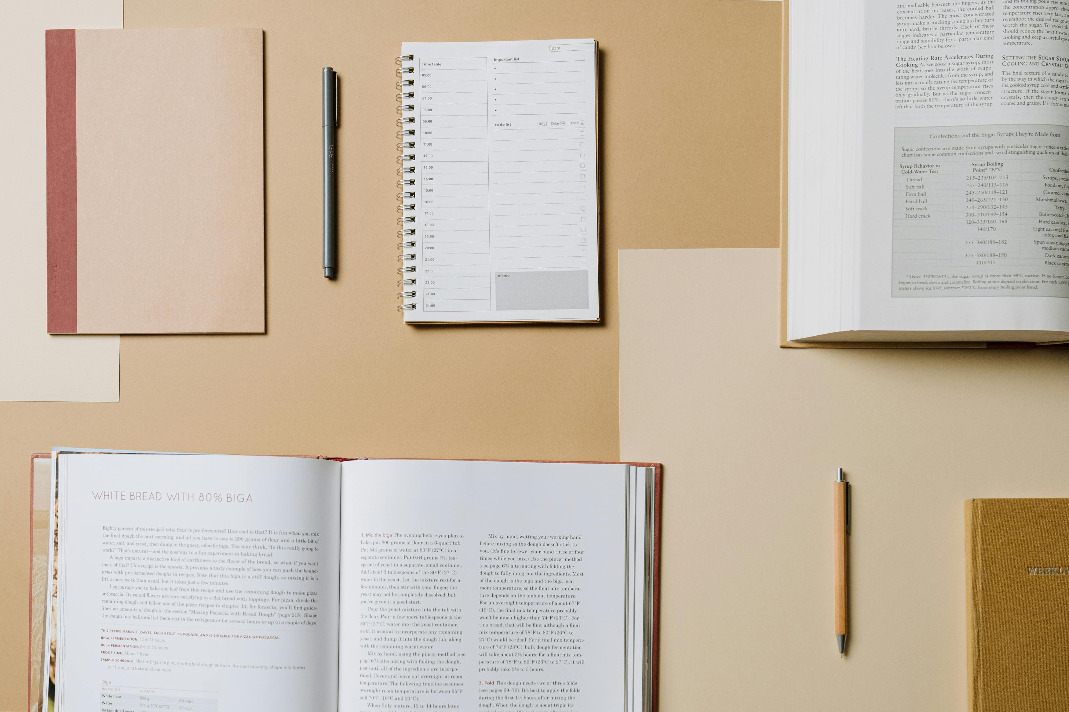 books and notebooks on table