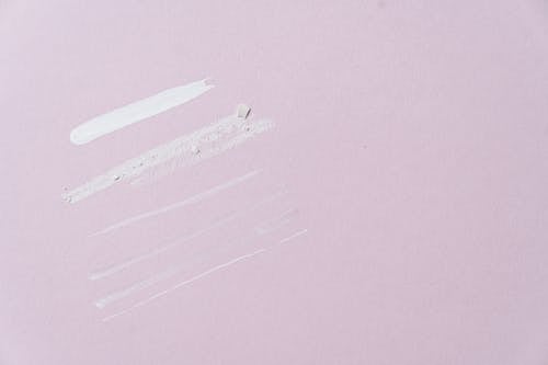 A Stripe of Gel on a Pink Wallpaper