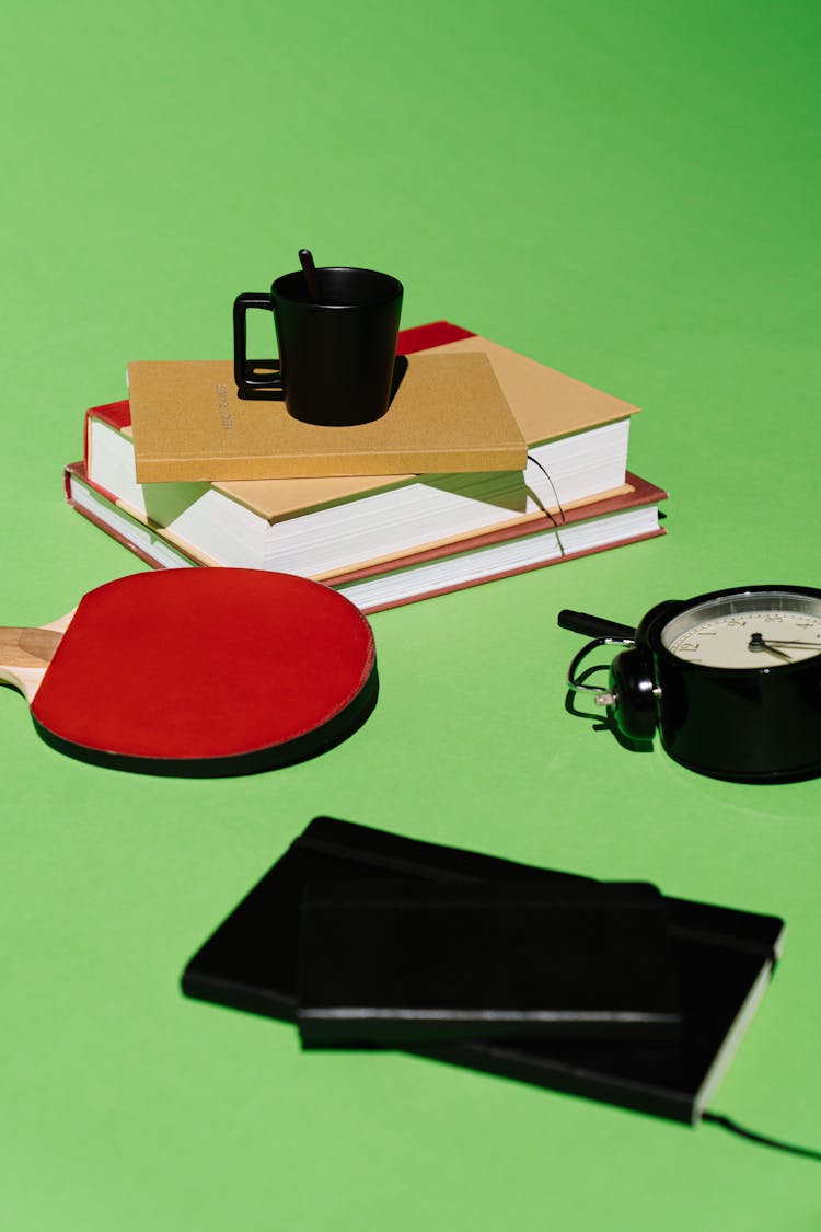 Black Ceramic Mug On Green Table