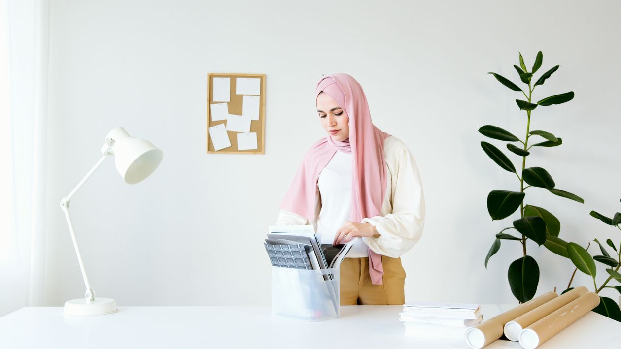 Woman in White Long Sleeve Shirt and Pink Hijab Standing beside White ...
