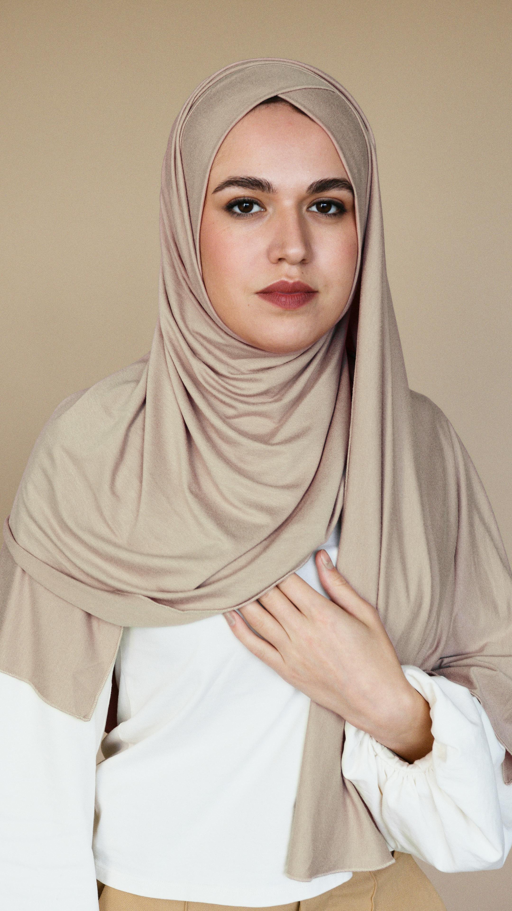 Woman in Gray Hijab Using Laptop · Free Stock Photo