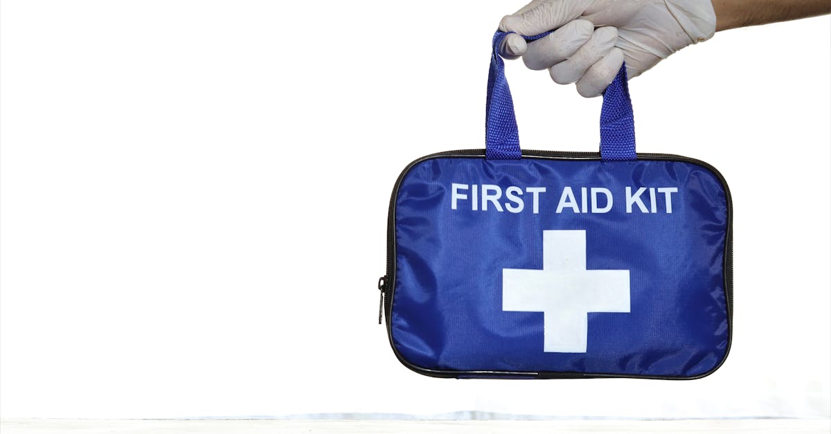 Person Holding First Aid Kit