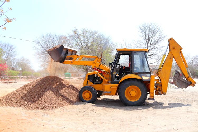 Yellow Front Loader At Construction Site