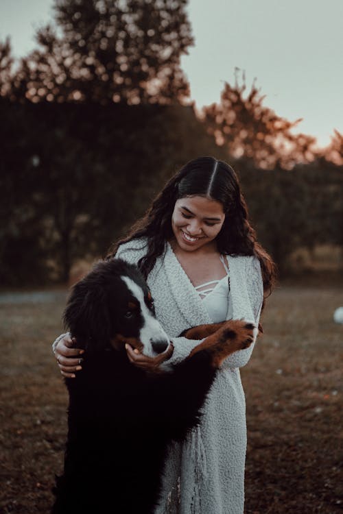 Woman Petting Dog