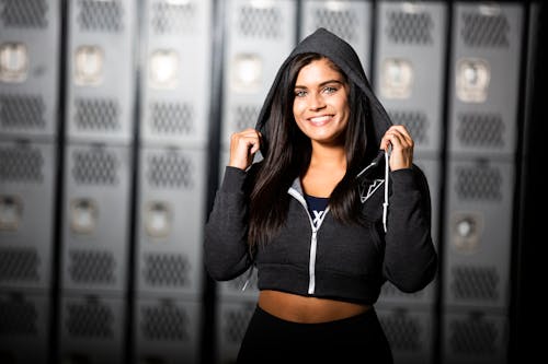 A Woman in Gray Hoodie Jacket Smiling