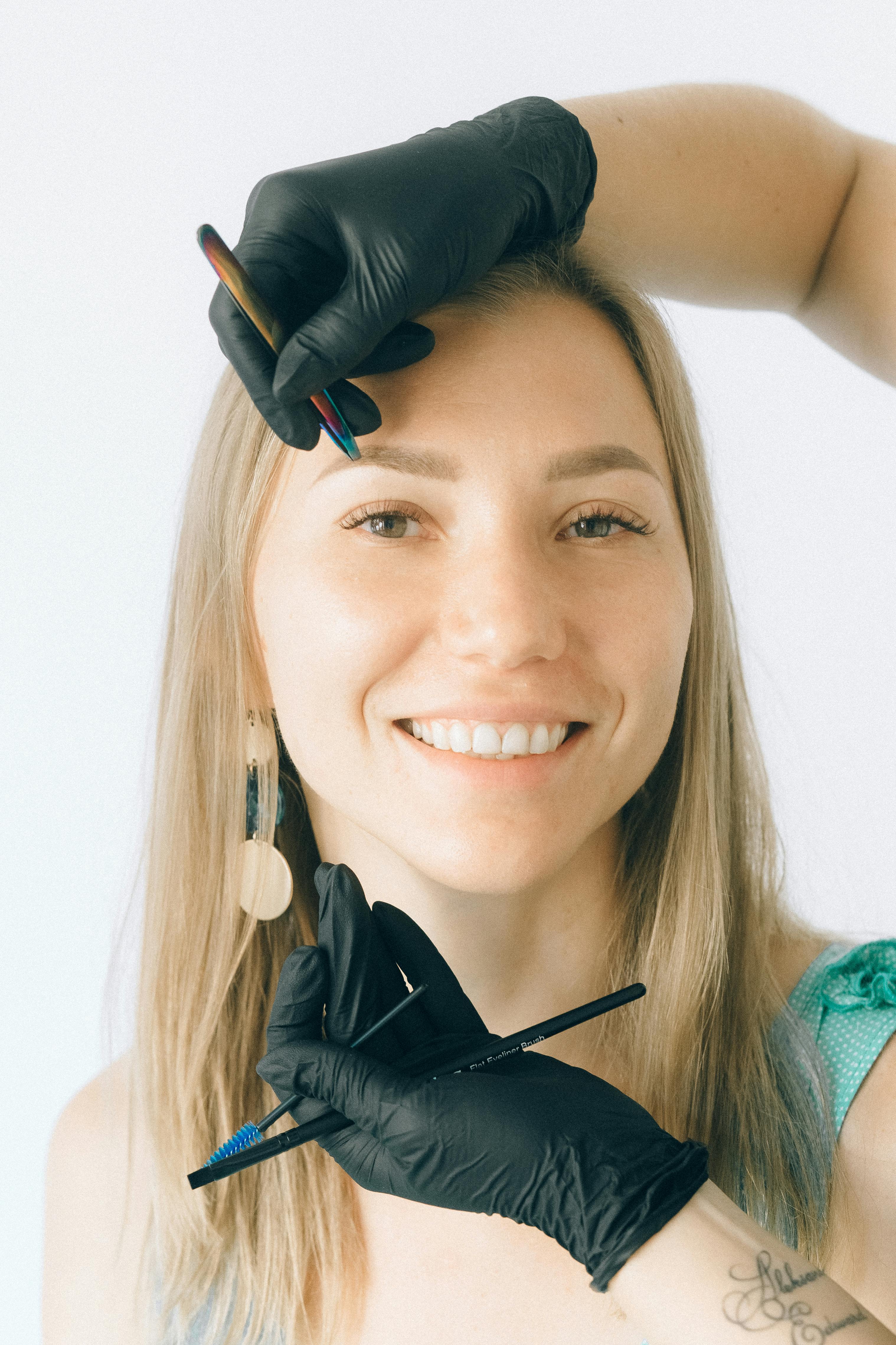 woman in black leather jacket smiling