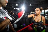 Woman in Black and Red Boxing Gloves