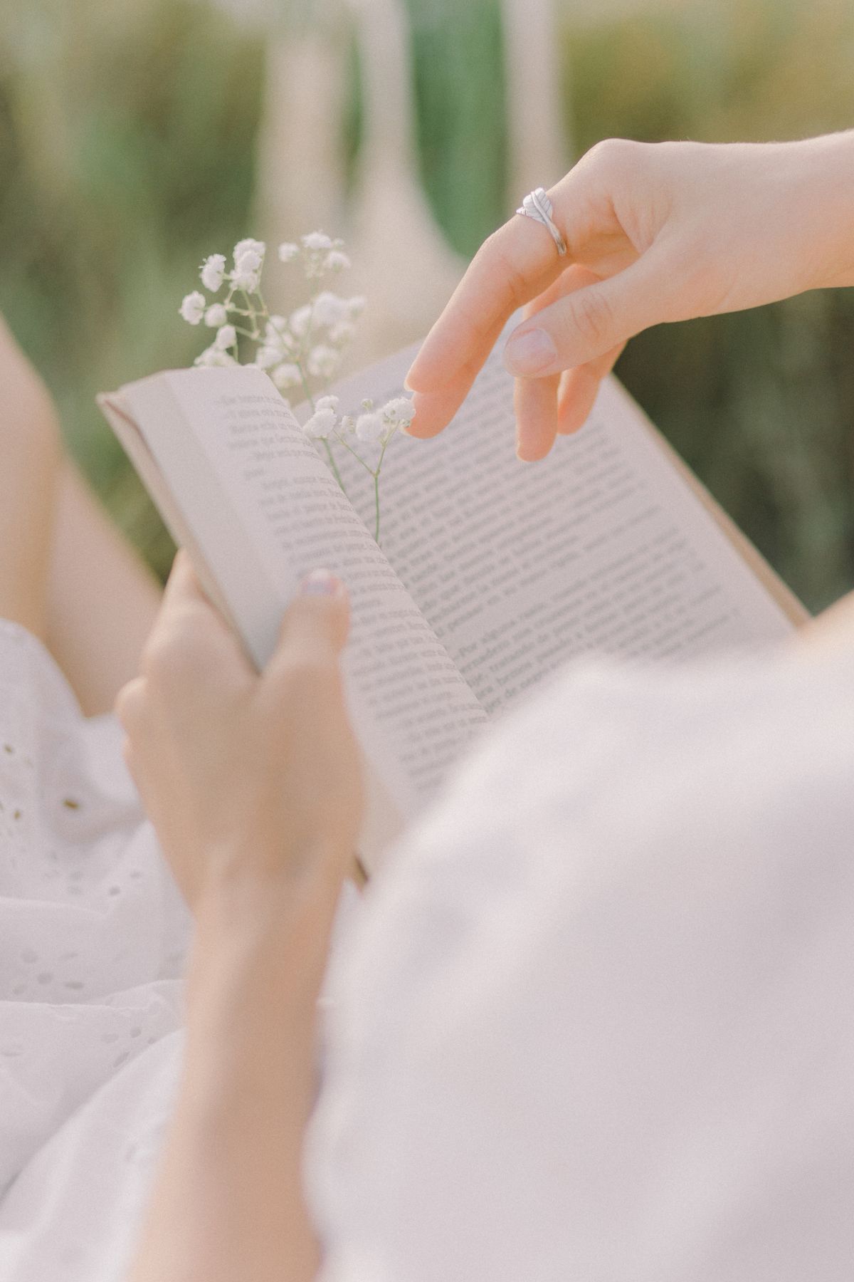 Open book with a flower bookmark