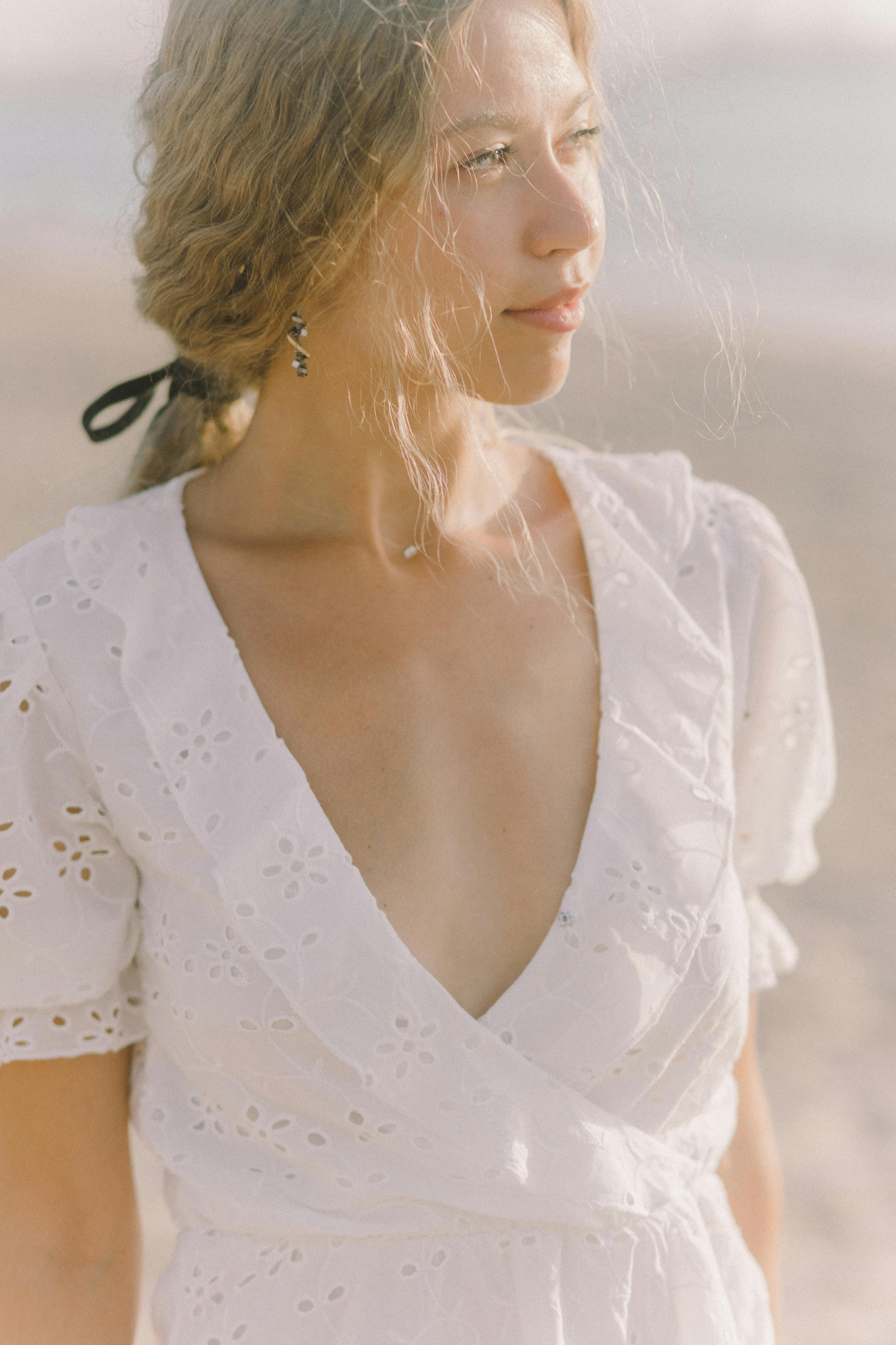 portrait of a woman wearing white dress