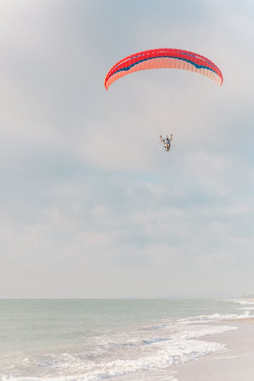 Free A Person Doing Paragliding Stock Photo