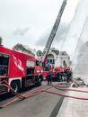 Red and White Fire Truck on Road