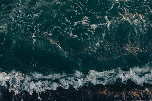 Free Aerial shot capturing the dynamic movement of waves along the İstanbul seashore. Stock Photo