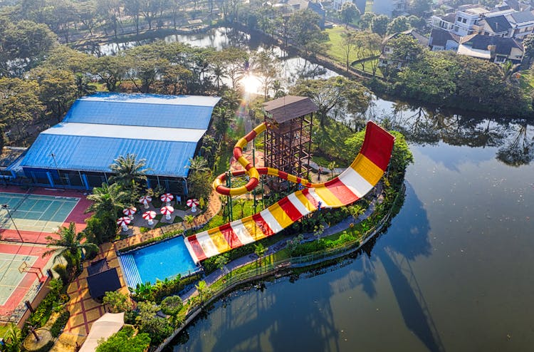 Aerial View Of A Water Park With Slide